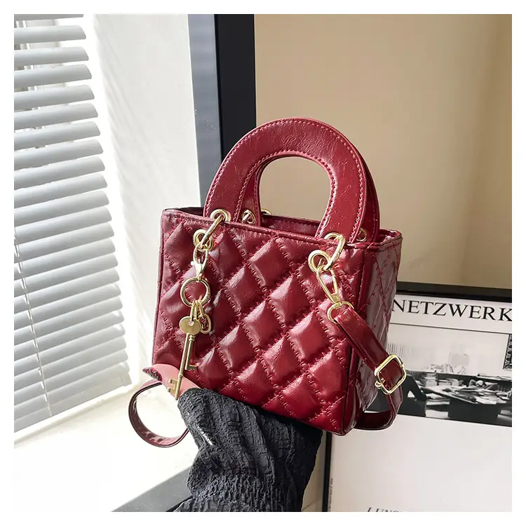 White Quilted Handbag with Gold Chain & Bow — feature 24