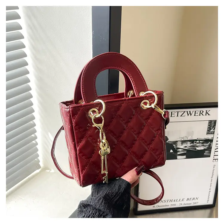 White Quilted Handbag with Gold Chain & Bow — feature 25