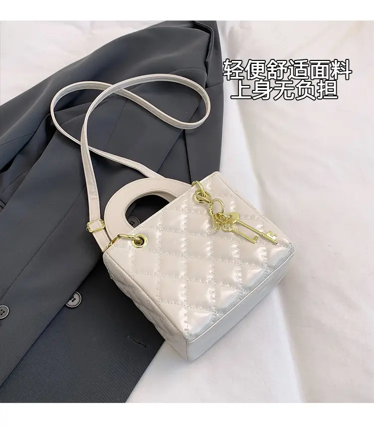 White Quilted Handbag with Gold Chain & Bow — feature 5