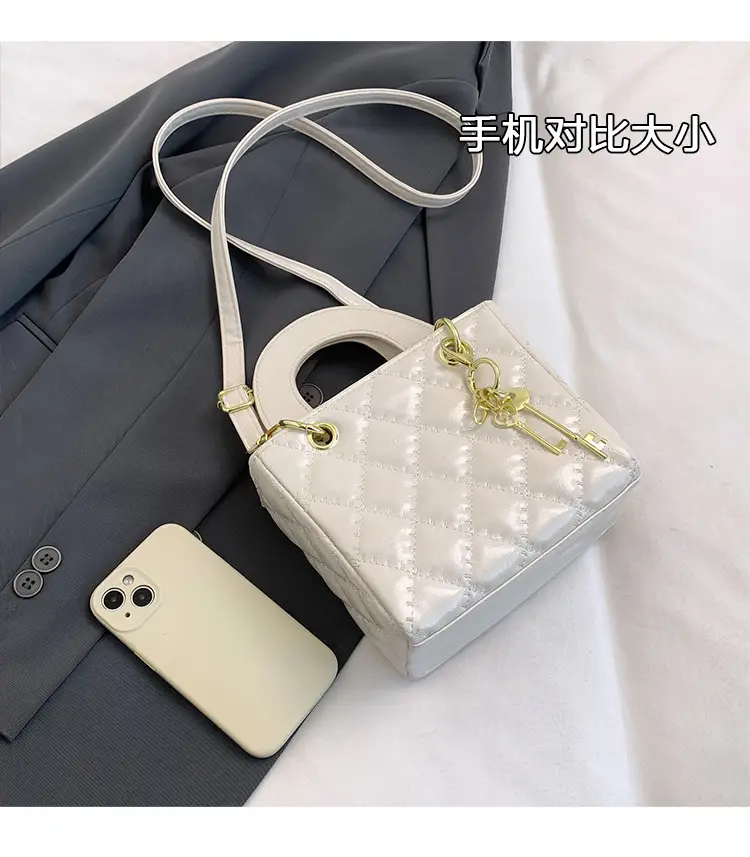 White Quilted Handbag with Gold Chain & Bow — feature 6
