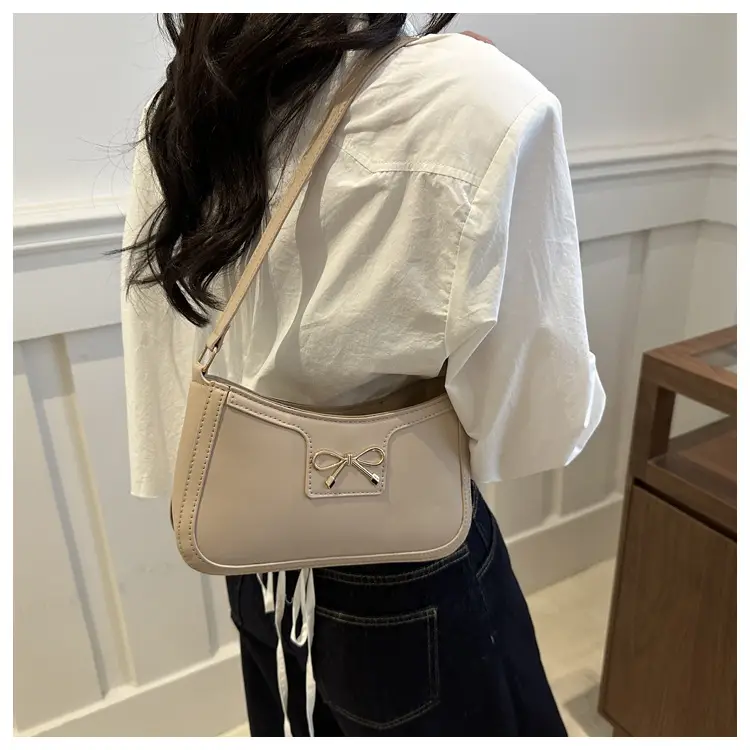 Women's Brown Leather Shoulder Bag with Bow Detail — feature 19