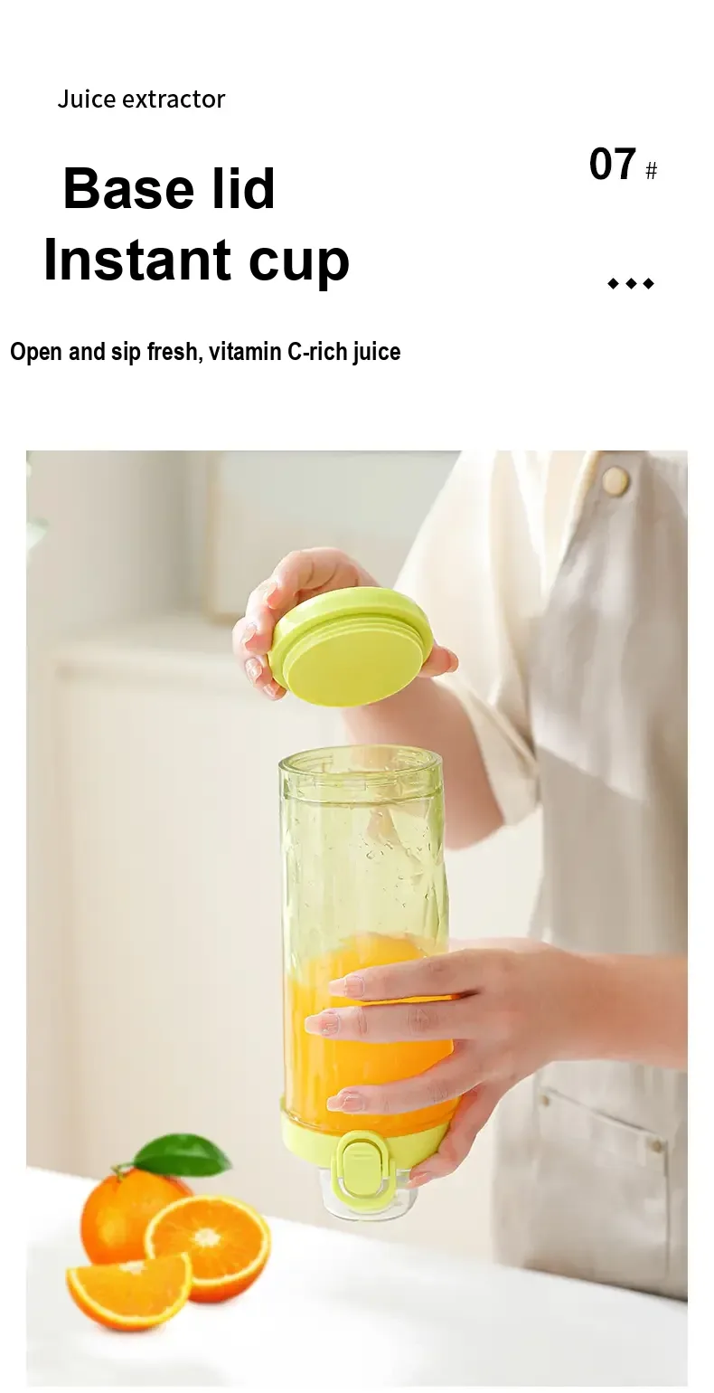 Removable round base cover held above the open juicer cup.