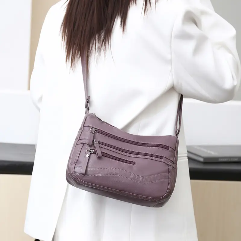 Black Leather Crossbody Bag with Multiple Compartments - Image 8