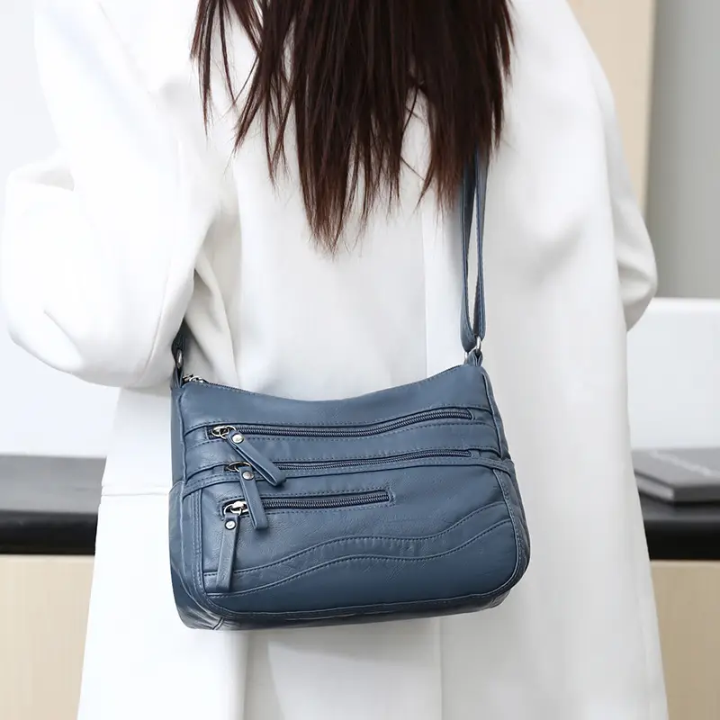 Black Leather Crossbody Bag with Multiple Compartments - Image 10