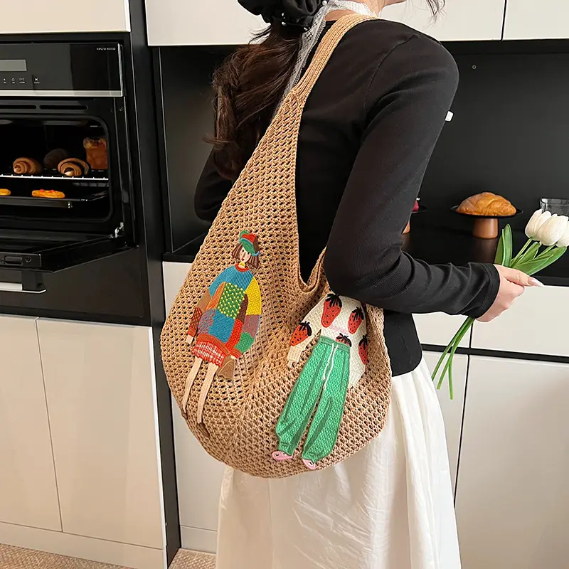 Women's Hollow Woven Straw Bag with Cartoon Design - Image 2