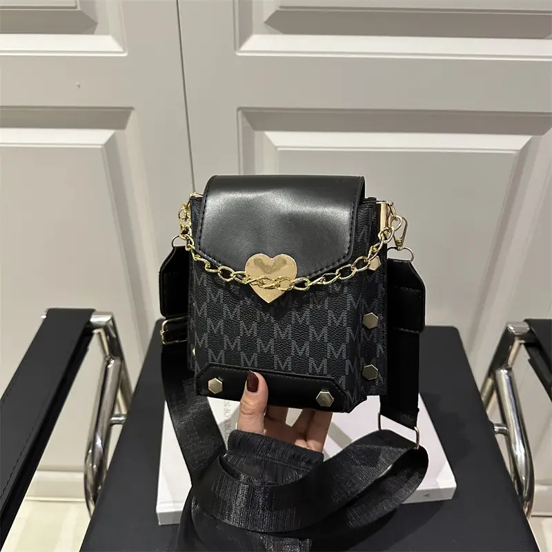 Women's tan chain strap shoulder bag with monogram pattern - Image 9