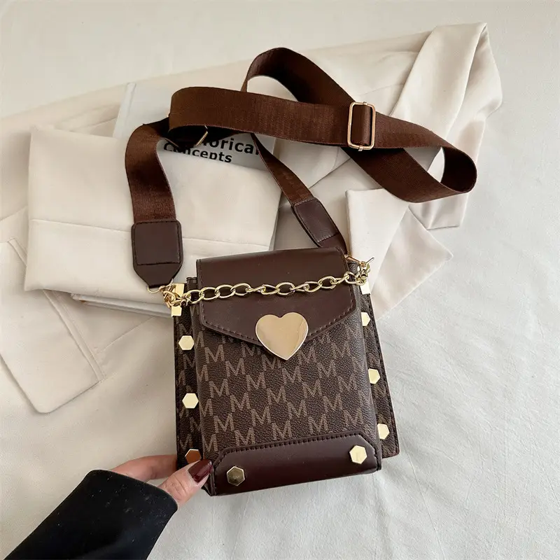 Women's tan chain strap shoulder bag with monogram pattern - Image 5