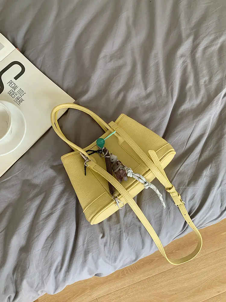 Women's Yellow Leather Bucket Bag Spring 2025 — feature 1