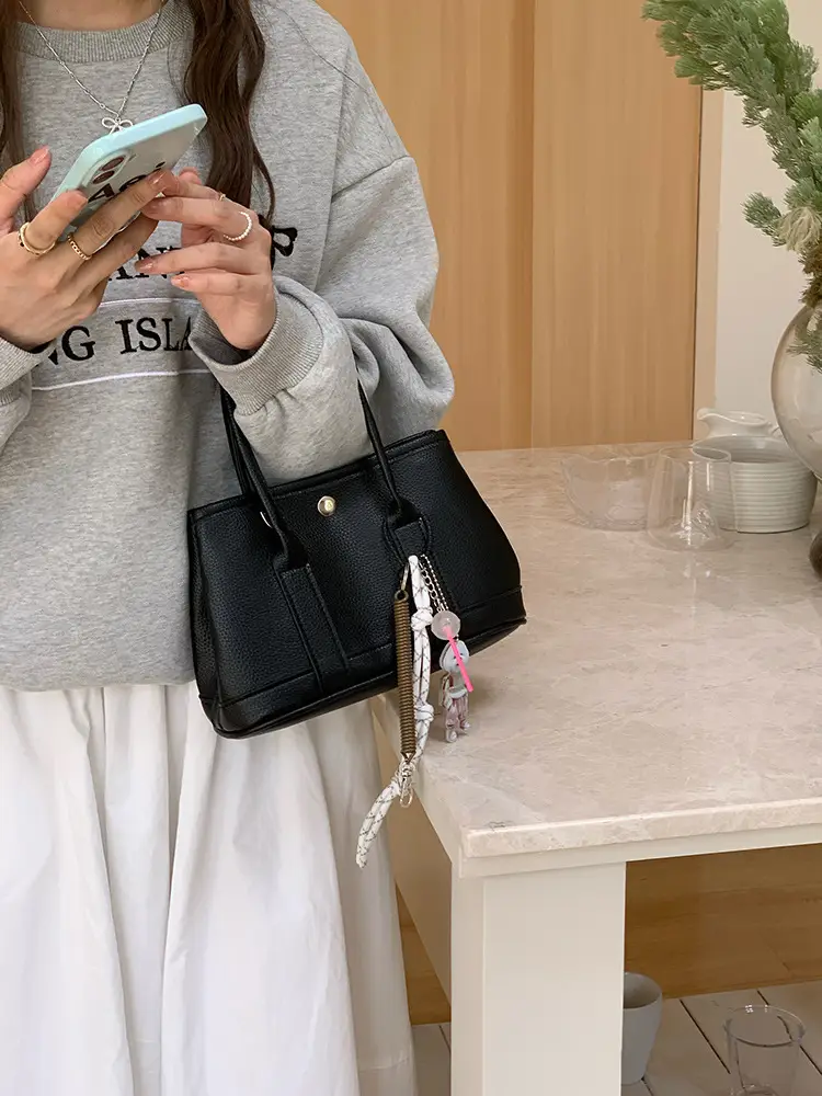 Women's Yellow Leather Bucket Bag Spring 2025 — feature 14