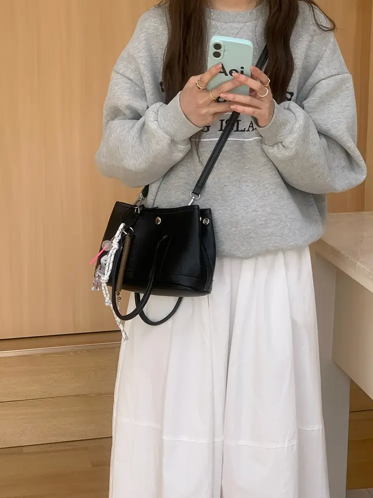 Women's Yellow Leather Bucket Bag Spring 2025 — feature 17