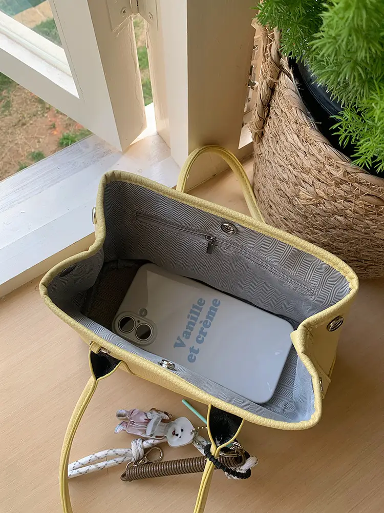 Women's Yellow Leather Bucket Bag Spring 2025 — feature 4