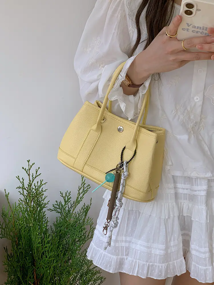 Women's Yellow Leather Bucket Bag Spring 2025 — feature 6
