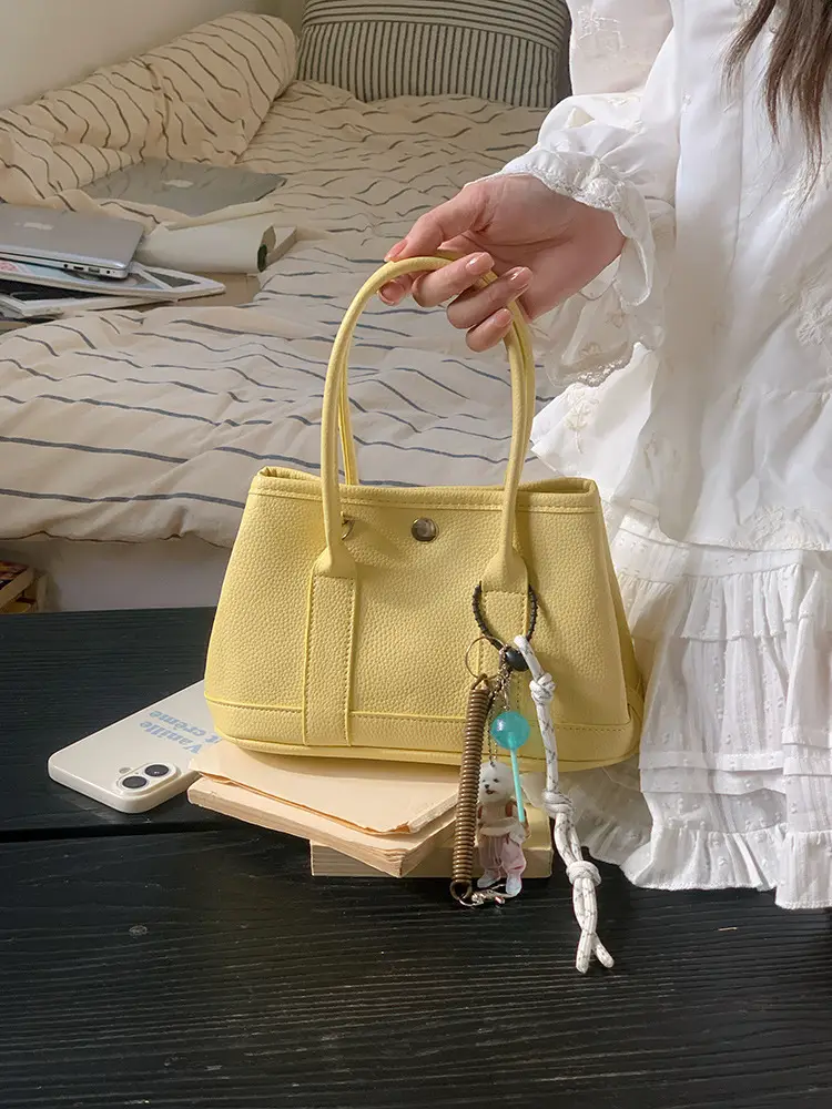 Women's Yellow Leather Bucket Bag Spring 2025 — feature 7