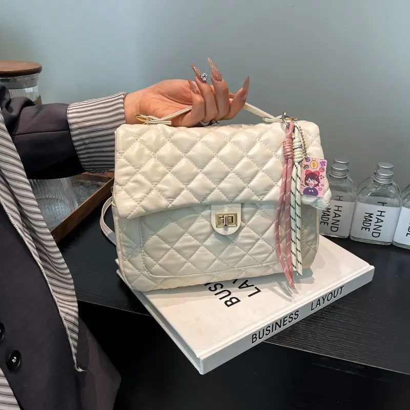Women's Cream Quilted Shoulder Bag with Tassel & Chain - Image 9