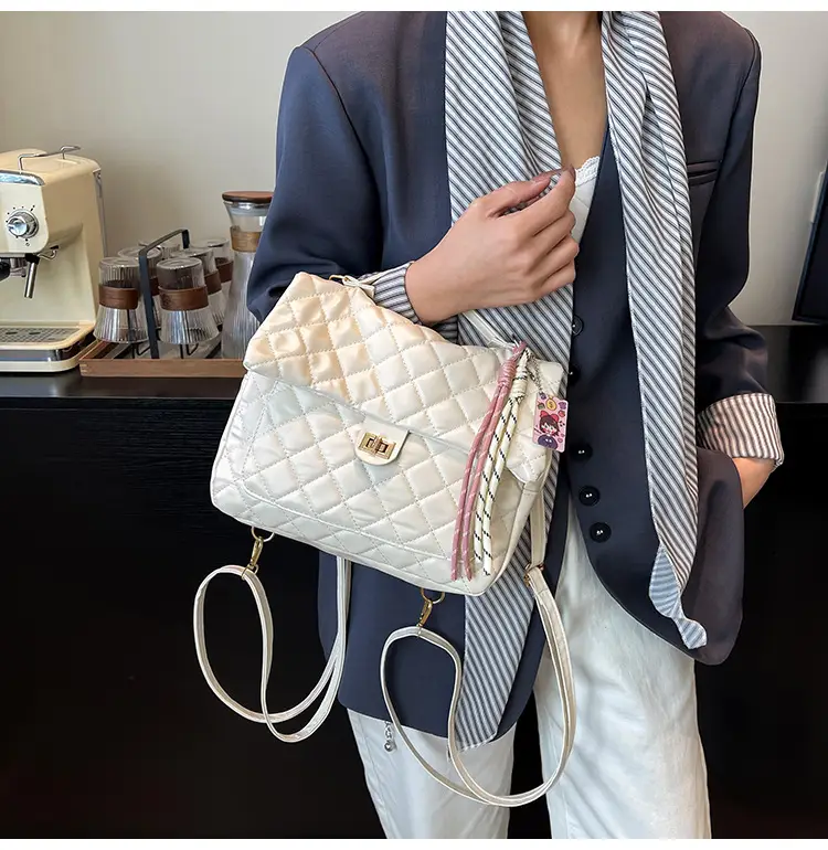Women's Cream Quilted Shoulder Bag with Tassel & Chain — feature 17