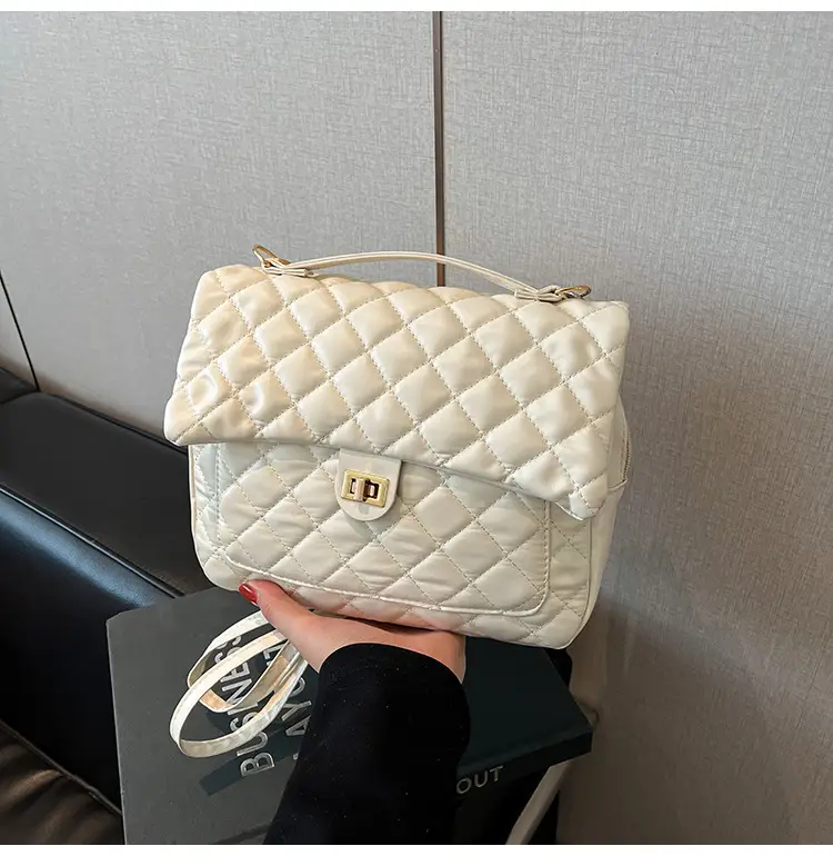 Women's Cream Quilted Shoulder Bag with Tassel & Chain - Image 2