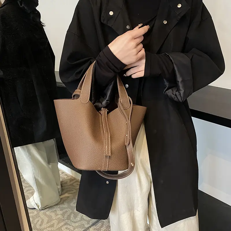 Stylish Brown Leather Handbag with Logo Print