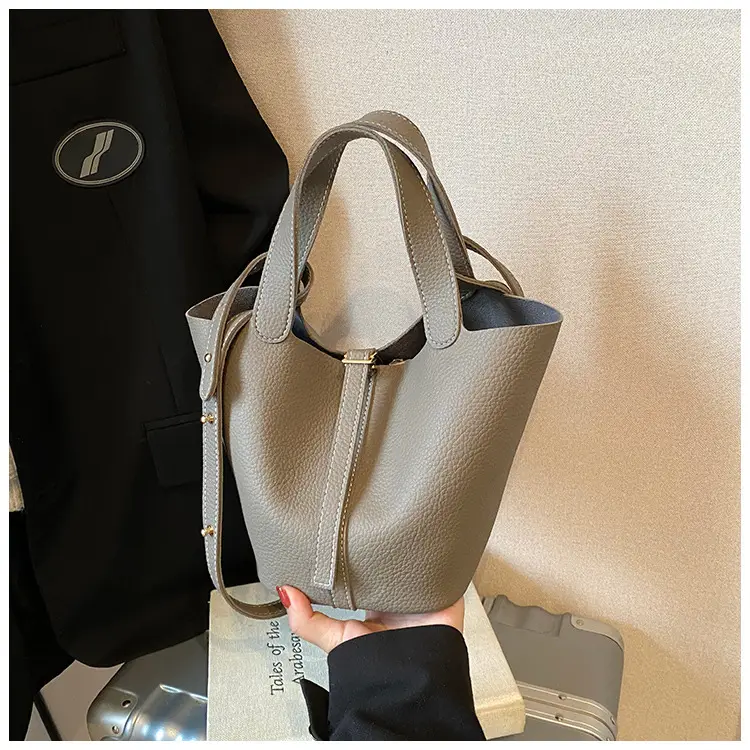 Stylish Brown Leather Handbag with Logo Print — feature 10