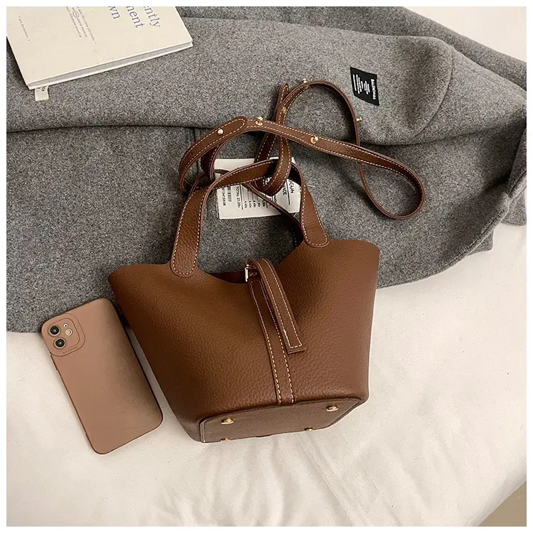 Stylish Brown Leather Handbag with Logo Print — feature 11
