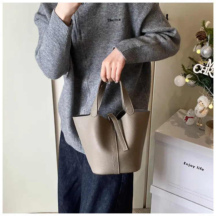 Stylish Brown Leather Handbag with Logo Print — feature 5