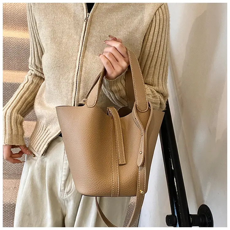Stylish Brown Leather Handbag with Logo Print — feature 6