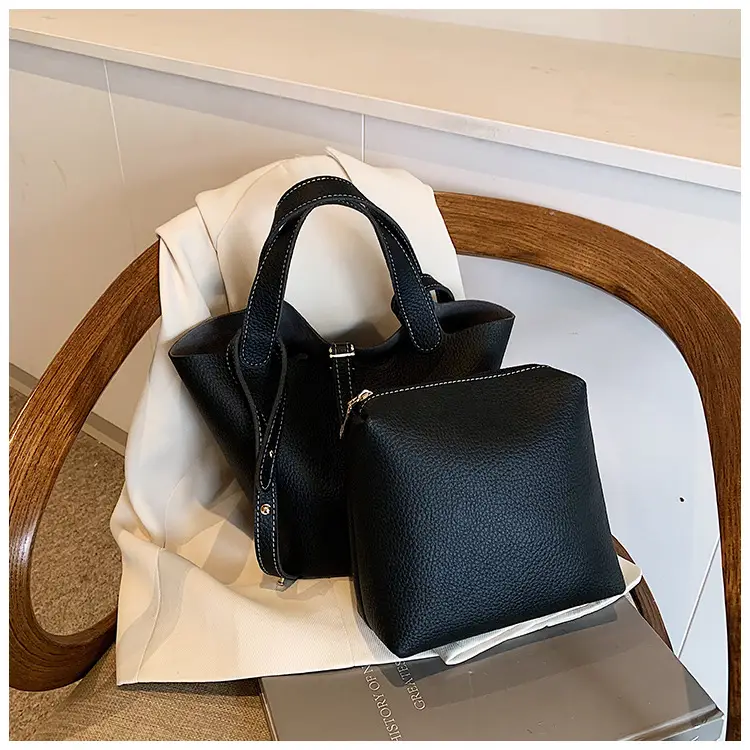 Stylish Brown Leather Handbag with Logo Print — feature 7