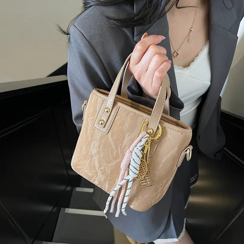 Women's Cream White Leather Bucket Bag with Gold Plated Handle - Image 9