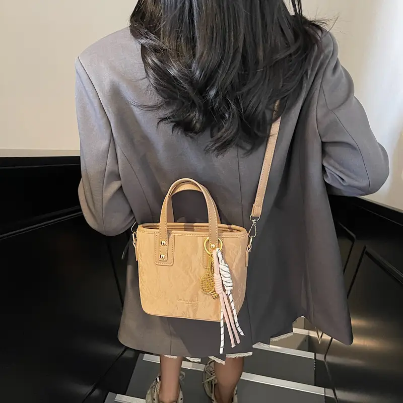 Women's Cream White Leather Bucket Bag with Gold Plated Handle - Image 10