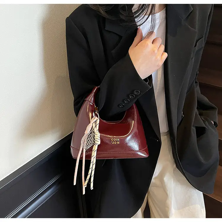 Women Crossbody Bag Brown Leather with Tassel Decor 2026 — feature 16