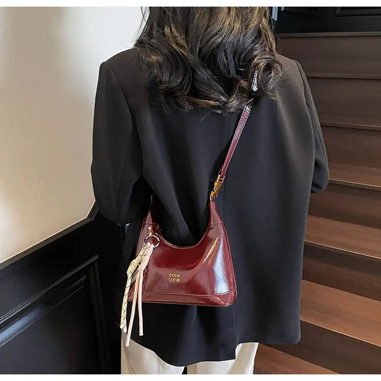 Women Crossbody Bag Brown Leather with Tassel Decor 2026 — feature 18