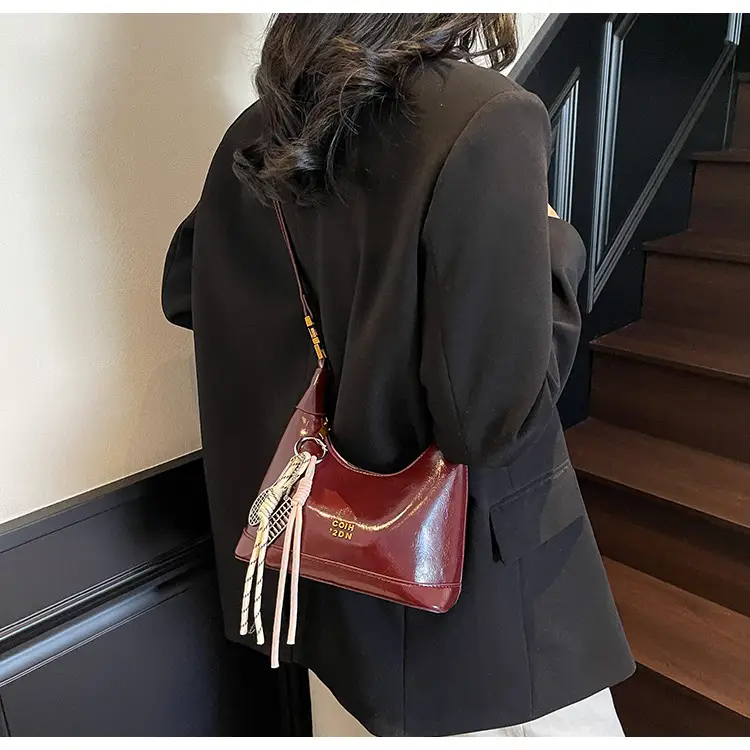 Women Crossbody Bag Brown Leather with Tassel Decor 2026 — feature 19