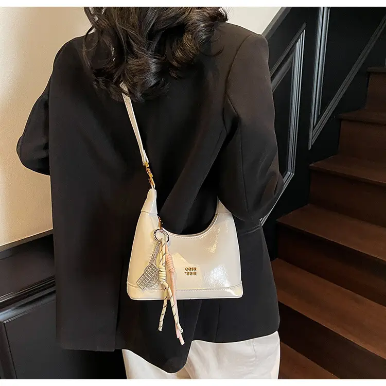 Women Crossbody Bag Brown Leather with Tassel Decor 2026 — feature 21