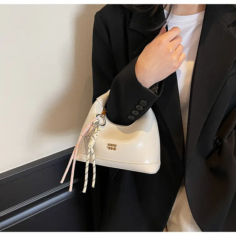 Women Crossbody Bag Brown Leather with Tassel Decor 2026 — feature 22