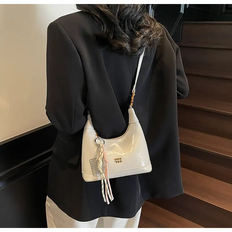 Women Crossbody Bag Brown Leather with Tassel Decor 2026 — feature 23