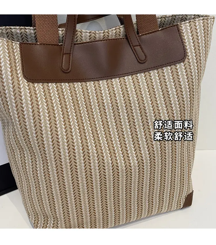 Women's Striped Woven Handbag with Brown Handles — feature 3