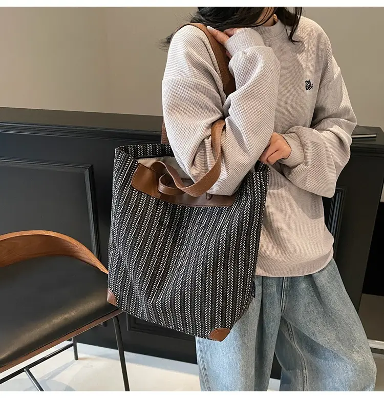 Women's Striped Woven Handbag with Brown Handles — feature 31