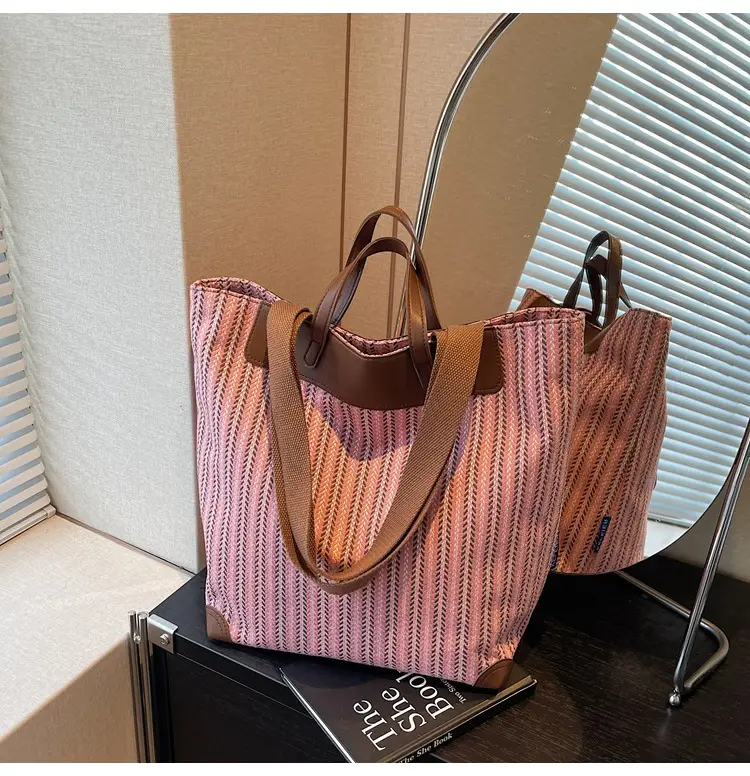 Women's Striped Woven Handbag with Brown Handles - Image 3