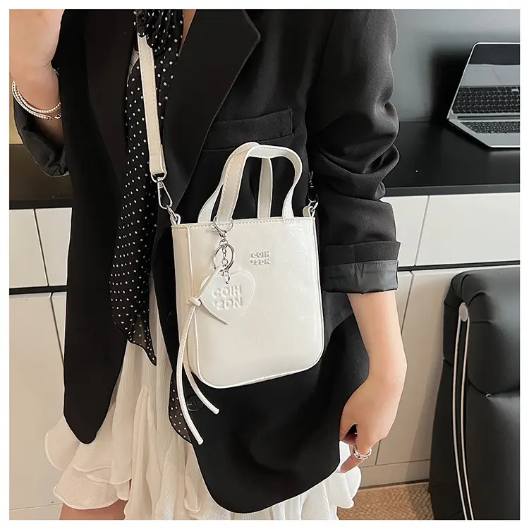 Women's Cream Textured Bucket Bag 2025 Summer — feature 13