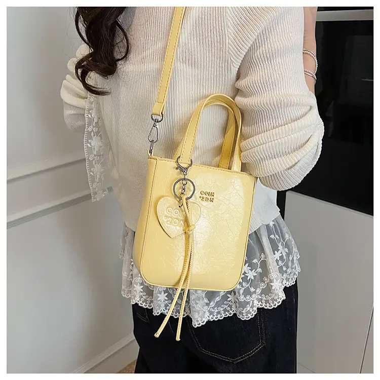 Women's Cream Textured Bucket Bag 2025 Summer — feature 16