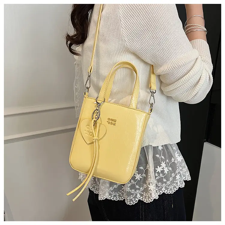 Women's Cream Textured Bucket Bag 2025 Summer — feature 17
