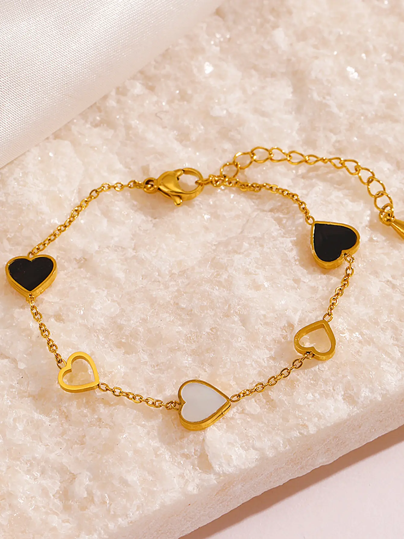 Hollow Heart Titanium Bracelet Gold Tone — feature 2