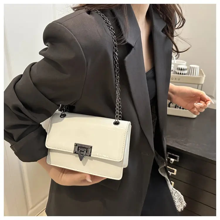 Orange Lock Chain Crossbody Bag for Women 2025 — feature 15