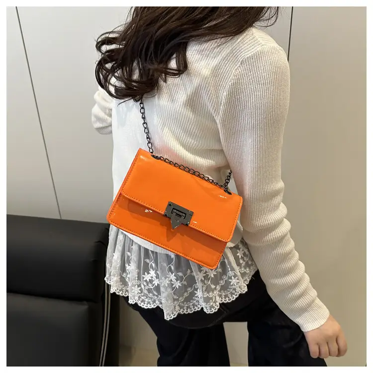Orange Lock Chain Crossbody Bag for Women 2025 — feature 23