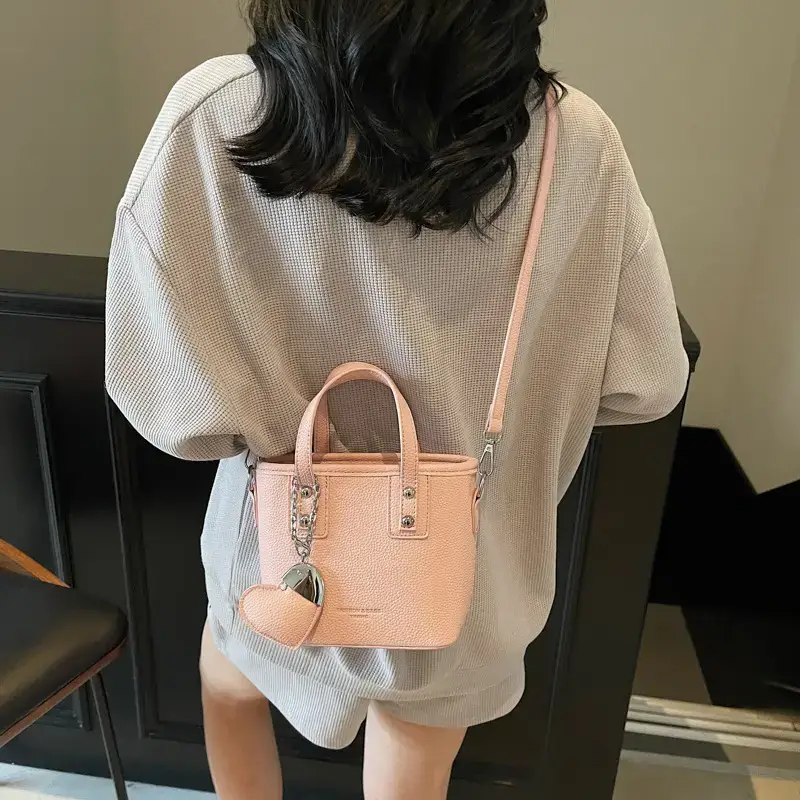 Women's Yellow Leather Bucket Bag with Heart Design - Image 9
