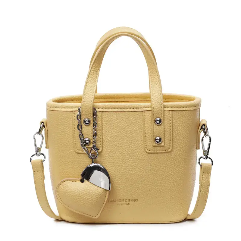 Women's Yellow Leather Bucket Bag with Heart Design - Image 4