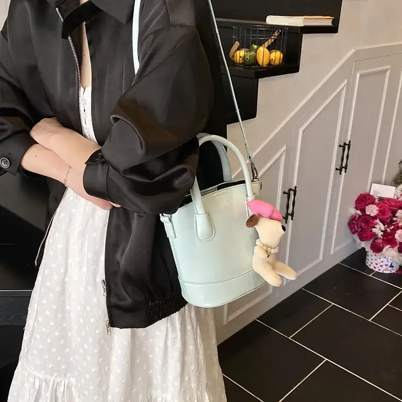 Women's Korean Style Bucket Bag with Cute Doll Decor - Image 7