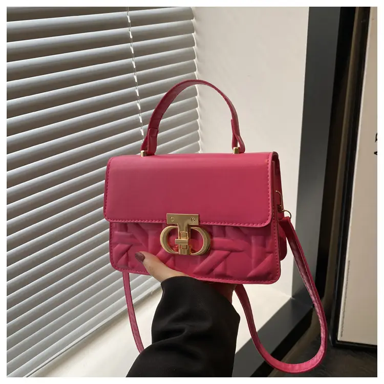 Pink Quilted Women's Crossbody Bag with Gold Clasp — feature 10