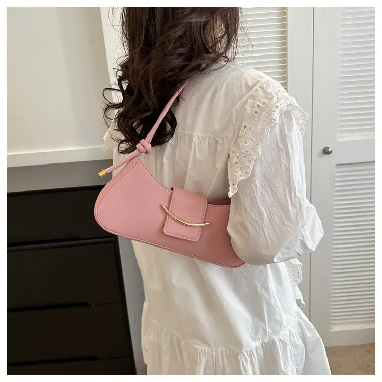 Pink Leather Messenger Bag with Gold Clasp — feature 14