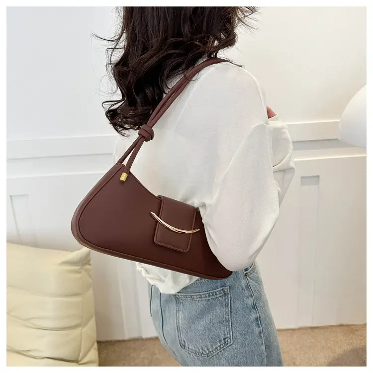Pink Leather Messenger Bag with Gold Clasp — feature 21