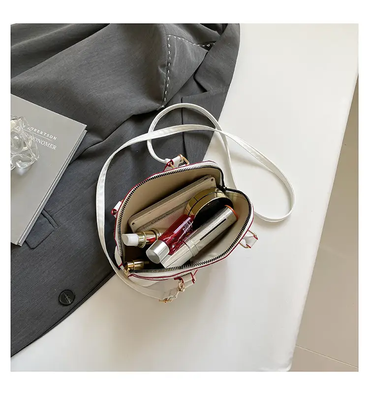2025 New Spring Crossbody Bag with Retro Print & White Base — feature 39